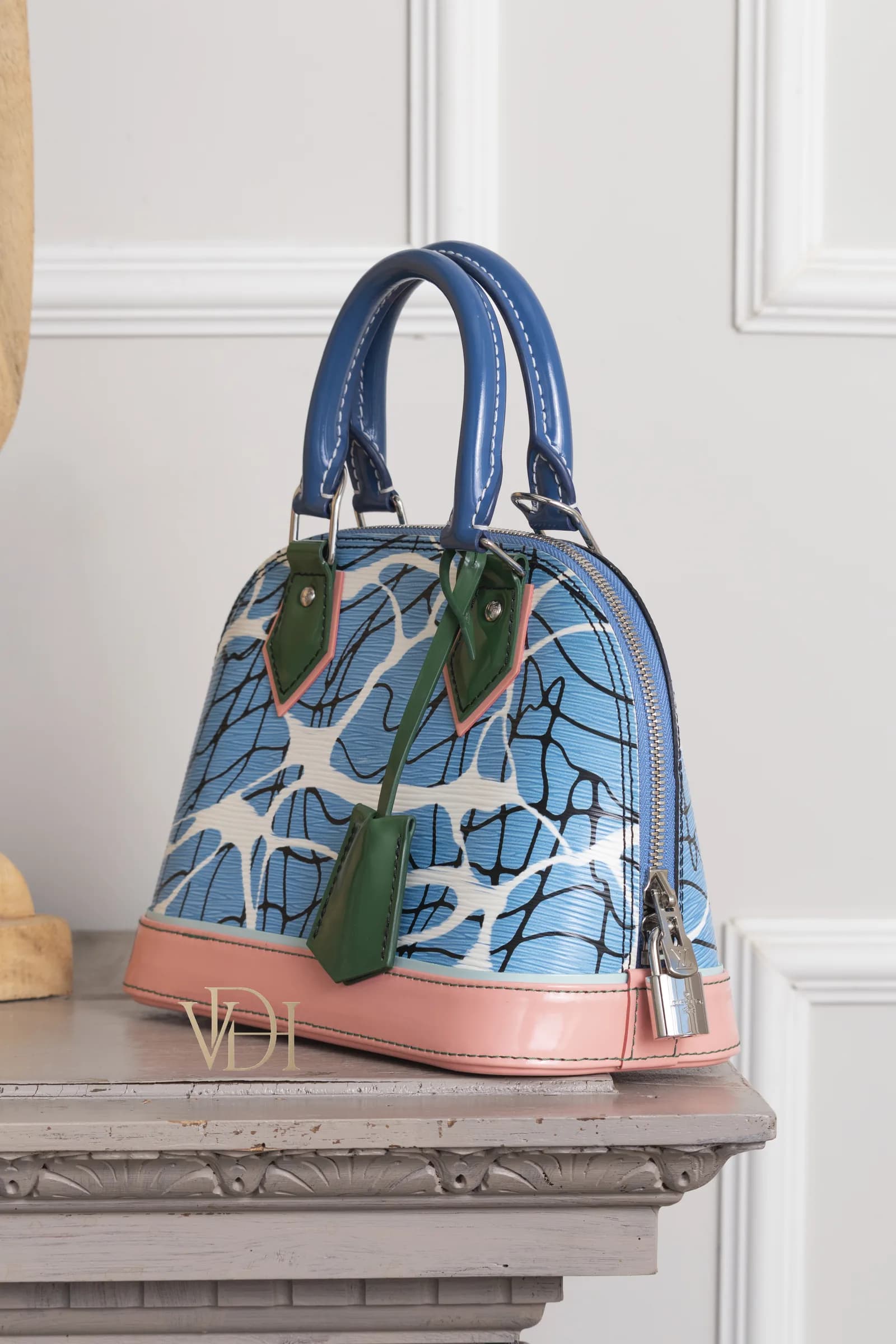 Attacco dei manici della Louis Vuitton Alma BB Epi Aqua